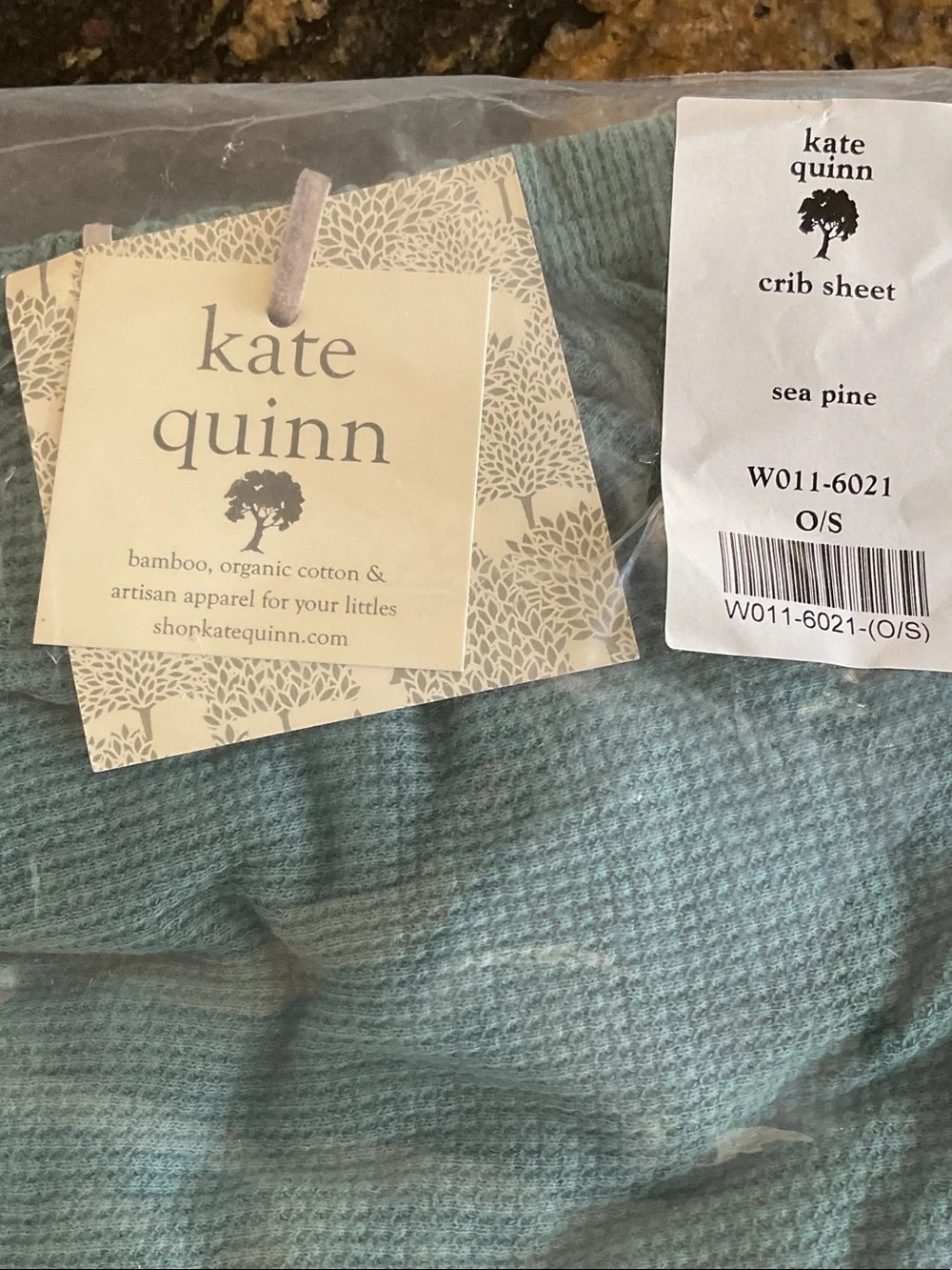 kate quinn Teal and Tan Waffle Knit and Solid Crib Sheets fits on a crib mattr